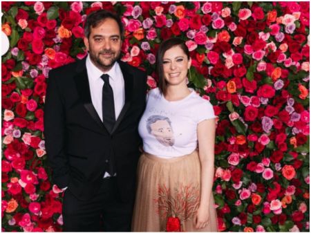 Adam Schlesinger in a black tux poses with ex-wife Michel.